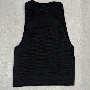 Lululemon Athletic Tank Top with wide arm openings and Vented . Size 2 or 4